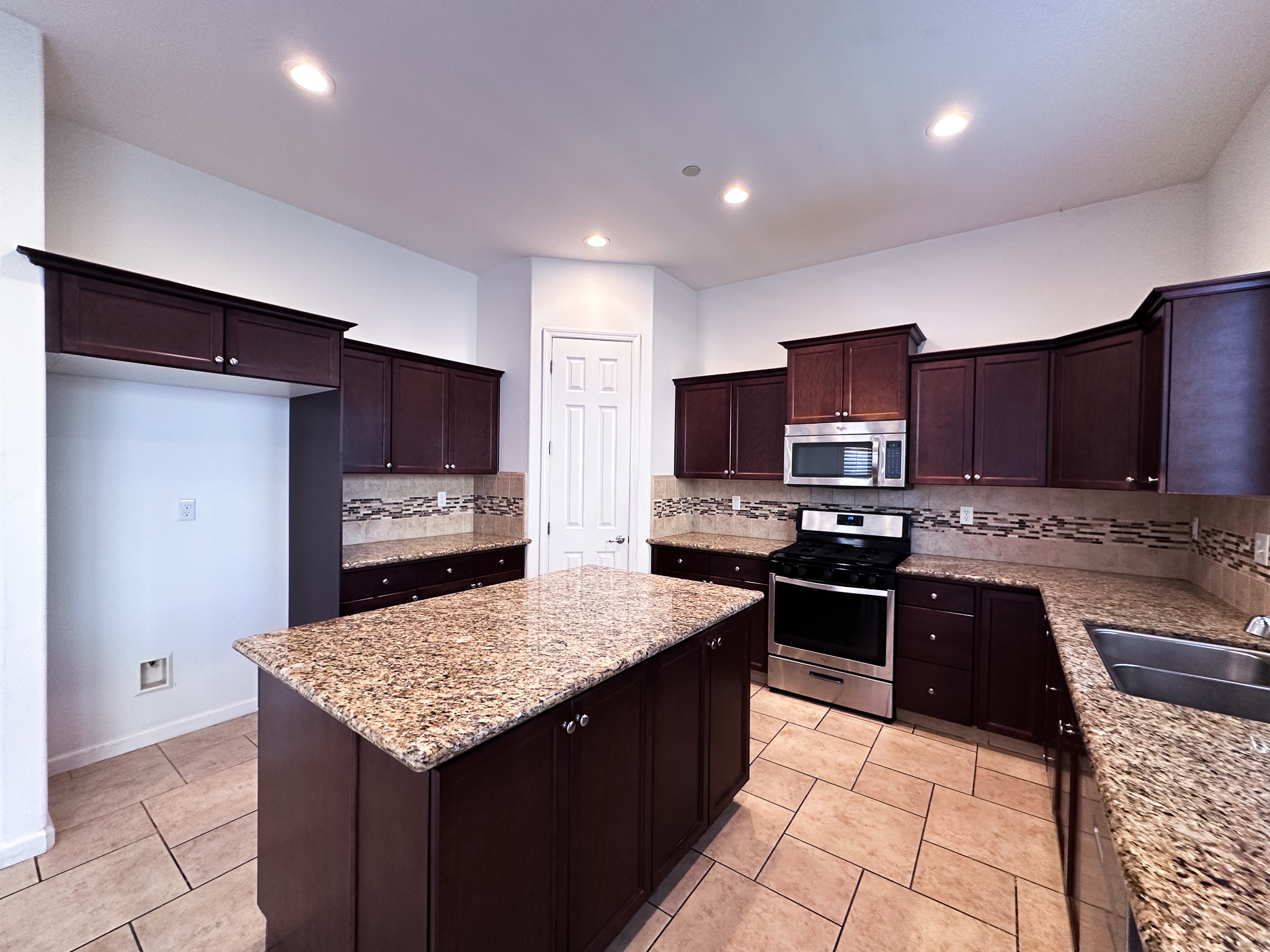 Kitchen with granite countertops